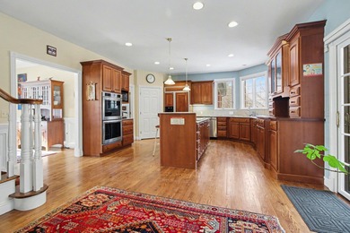 Nestled on a private, wooded half-acre cul-de-sac in the on Polo Fields Golf and Country Club in Michigan - for sale on GolfHomes.com, golf home, golf lot