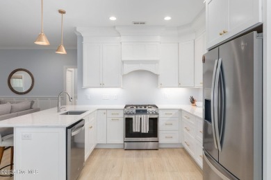 This classic one story, remodeled in 2022, is where modern and on Morehead City Country Club in North Carolina - for sale on GolfHomes.com, golf home, golf lot