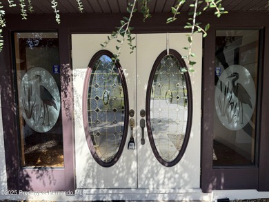 Unique 4-Bedroom Home on the Golf Course Of Ridge Manor Country on The Ridge Manor Oaks Golf and Country Club in Florida - for sale on GolfHomes.com, golf home, golf lot