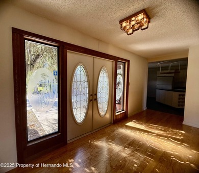 Unique 4-Bedroom Home on the Golf Course Of Ridge Manor Country on The Ridge Manor Oaks Golf and Country Club in Florida - for sale on GolfHomes.com, golf home, golf lot