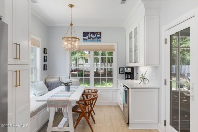 This classic one story, remodeled in 2022, is where modern and on Morehead City Country Club in North Carolina - for sale on GolfHomes.com, golf home, golf lot