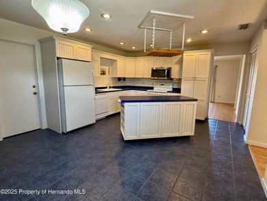 Unique 4-Bedroom Home on the Golf Course Of Ridge Manor Country on The Ridge Manor Oaks Golf and Country Club in Florida - for sale on GolfHomes.com, golf home, golf lot