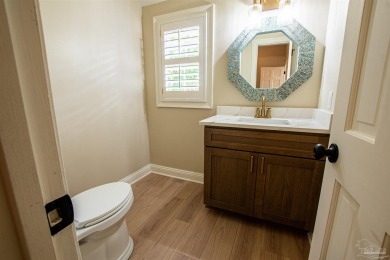 This stunning 3,663 sq. ft. home has been meticulously updated on Pensacola Country Club in Florida - for sale on GolfHomes.com, golf home, golf lot