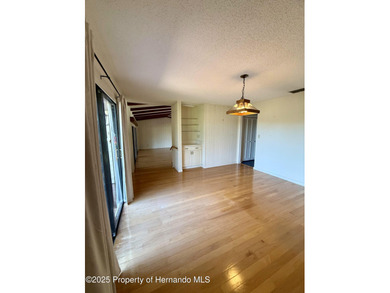 Unique 4-Bedroom Home on the Golf Course Of Ridge Manor Country on The Ridge Manor Oaks Golf and Country Club in Florida - for sale on GolfHomes.com, golf home, golf lot