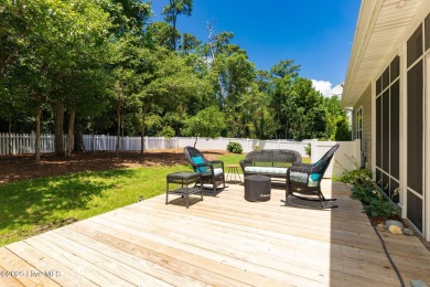This classic one story, remodeled in 2022, is where modern and on Morehead City Country Club in North Carolina - for sale on GolfHomes.com, golf home, golf lot