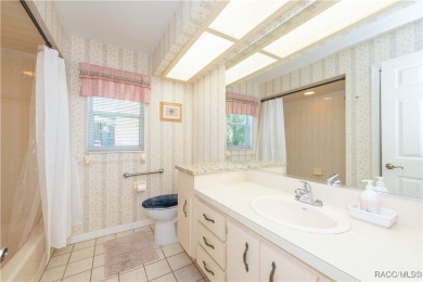 Cozy Front Porch & Move-In Ready Home in Oak Village at on Sugarmill Woods Golf and Country Club in Florida - for sale on GolfHomes.com, golf home, golf lot