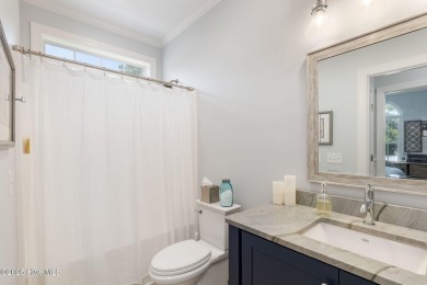 This classic one story, remodeled in 2022, is where modern and on Morehead City Country Club in North Carolina - for sale on GolfHomes.com, golf home, golf lot