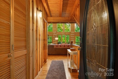 Prepare to fall in love with this beautifully updated mountain on Wolf Laurel Country Club in North Carolina - for sale on GolfHomes.com, golf home, golf lot