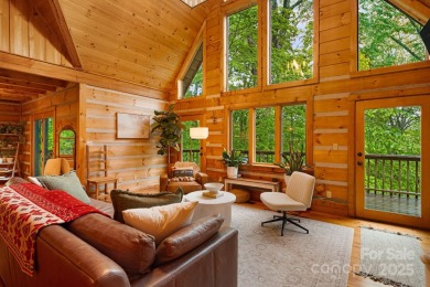 Prepare to fall in love with this beautifully updated mountain on Wolf Laurel Country Club in North Carolina - for sale on GolfHomes.com, golf home, golf lot