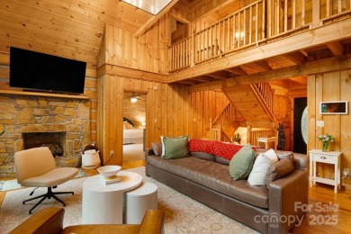 Prepare to fall in love with this beautifully updated mountain on Wolf Laurel Country Club in North Carolina - for sale on GolfHomes.com, golf home, golf lot
