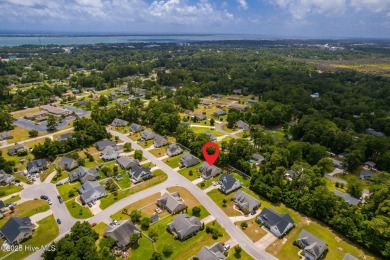This classic one story, remodeled in 2022, is where modern and on Morehead City Country Club in North Carolina - for sale on GolfHomes.com, golf home, golf lot