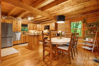 Prepare to fall in love with this beautifully updated mountain on Wolf Laurel Country Club in North Carolina - for sale on GolfHomes.com, golf home, golf lot