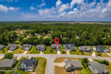 This classic one story, remodeled in 2022, is where modern and on Morehead City Country Club in North Carolina - for sale on GolfHomes.com, golf home, golf lot