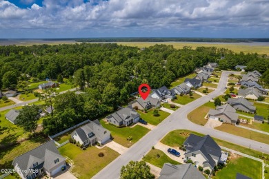 This classic one story, remodeled in 2022, is where modern and on Morehead City Country Club in North Carolina - for sale on GolfHomes.com, golf home, golf lot