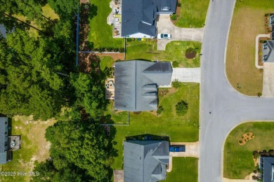 This classic one story, remodeled in 2022, is where modern and on Morehead City Country Club in North Carolina - for sale on GolfHomes.com, golf home, golf lot