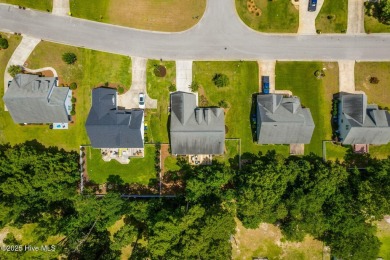 This classic one story, remodeled in 2022, is where modern and on Morehead City Country Club in North Carolina - for sale on GolfHomes.com, golf home, golf lot