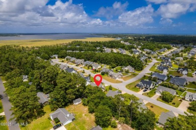 This classic one story, remodeled in 2022, is where modern and on Morehead City Country Club in North Carolina - for sale on GolfHomes.com, golf home, golf lot