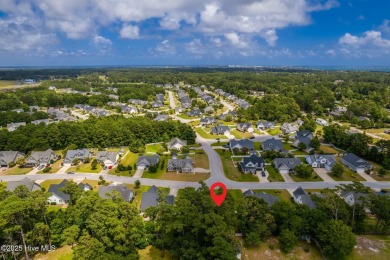 This classic one story, remodeled in 2022, is where modern and on Morehead City Country Club in North Carolina - for sale on GolfHomes.com, golf home, golf lot
