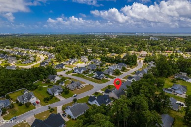 This classic one story, remodeled in 2022, is where modern and on Morehead City Country Club in North Carolina - for sale on GolfHomes.com, golf home, golf lot