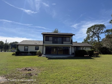 Unique 4-Bedroom Home on the Golf Course Of Ridge Manor Country on The Ridge Manor Oaks Golf and Country Club in Florida - for sale on GolfHomes.com, golf home, golf lot