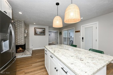 This beautifully designed and updated ranch residence features 2 on Ohio Prestwick Country Club in Ohio - for sale on GolfHomes.com, golf home, golf lot