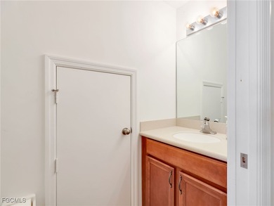 Discover exceptional living in this stunning two-story residence on Valencia Golf and Country Club in Florida - for sale on GolfHomes.com, golf home, golf lot