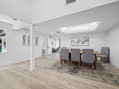 Located in the quiet, gated community of Bay Isles on Longboat on Longboat Key Golf Club Resort in Florida - for sale on GolfHomes.com, golf home, golf lot
