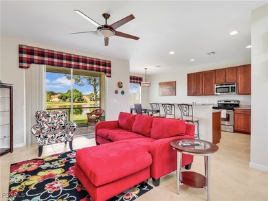 Discover exceptional living in this stunning two-story residence on Valencia Golf and Country Club in Florida - for sale on GolfHomes.com, golf home, golf lot