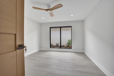 Exceptional 3 bedroom, 3 full bath residence is a private on Boca Woods Country Club in Florida - for sale on GolfHomes.com, golf home, golf lot