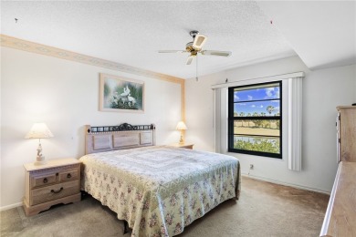 Welcome to your cozy, turnkey condo boasting breathtaking lake & on Vista Plantation Golf Club in Florida - for sale on GolfHomes.com, golf home, golf lot