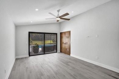 Exceptional 3 bedroom, 3 full bath residence is a private on  in Florida - for sale on GolfHomes.com, golf home, golf lot