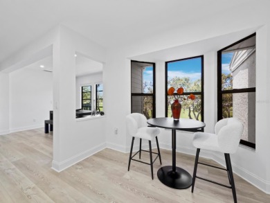 Located in the quiet, gated community of Bay Isles on Longboat on Longboat Key Golf Club Resort in Florida - for sale on GolfHomes.com, golf home, golf lot