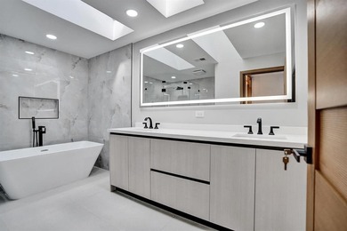 Exceptional 3 bedroom, 3 full bath residence is a private on Boca Woods Country Club in Florida - for sale on GolfHomes.com, golf home, golf lot