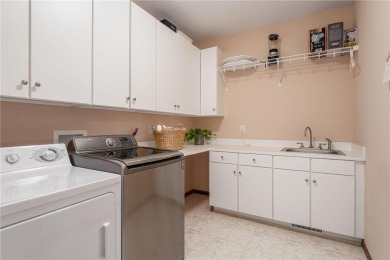 Step into this stunningly updated Boulder Ridge townhome, where on Eagle Lake Golf Center in Minnesota - for sale on GolfHomes.com, golf home, golf lot