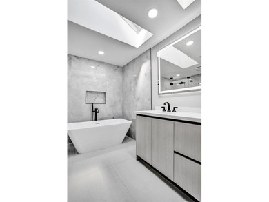 Exceptional 3 bedroom, 3 full bath residence is a private on Boca Woods Country Club in Florida - for sale on GolfHomes.com, golf home, golf lot