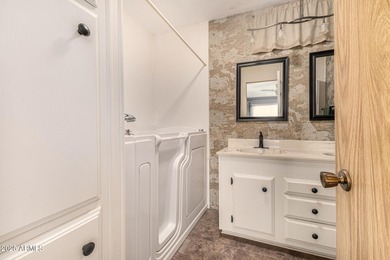 Great curb appeal to this corner lot 2 bed 2 bath furnished home on Fountain of the Sun Country Club in Arizona - for sale on GolfHomes.com, golf home, golf lot