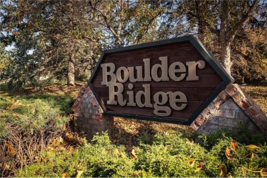 Step into this stunningly updated Boulder Ridge townhome, where on Eagle Lake Golf Center in Minnesota - for sale on GolfHomes.com, golf home, golf lot