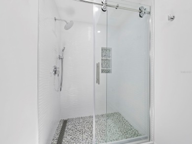 Located in the quiet, gated community of Bay Isles on Longboat on Longboat Key Golf Club Resort in Florida - for sale on GolfHomes.com, golf home, golf lot