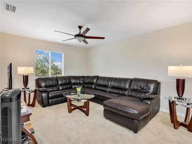 Discover exceptional living in this stunning two-story residence on Valencia Golf and Country Club in Florida - for sale on GolfHomes.com, golf home, golf lot