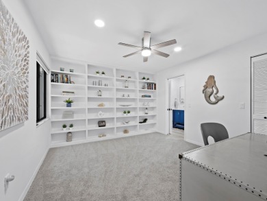 Located in the quiet, gated community of Bay Isles on Longboat on Longboat Key Golf Club Resort in Florida - for sale on GolfHomes.com, golf home, golf lot