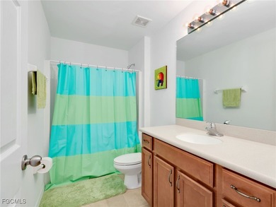 Discover exceptional living in this stunning two-story residence on Valencia Golf and Country Club in Florida - for sale on GolfHomes.com, golf home, golf lot