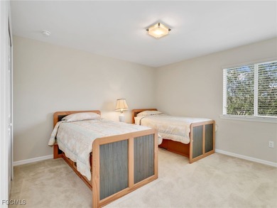 Discover exceptional living in this stunning two-story residence on Valencia Golf and Country Club in Florida - for sale on GolfHomes.com, golf home, golf lot