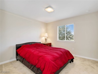 Discover exceptional living in this stunning two-story residence on Valencia Golf and Country Club in Florida - for sale on GolfHomes.com, golf home, golf lot