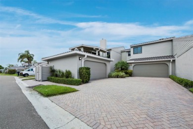 Located in the quiet, gated community of Bay Isles on Longboat on Longboat Key Golf Club Resort in Florida - for sale on GolfHomes.com, golf home, golf lot