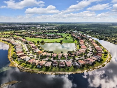 Discover exceptional living in this stunning two-story residence on Valencia Golf and Country Club in Florida - for sale on GolfHomes.com, golf home, golf lot