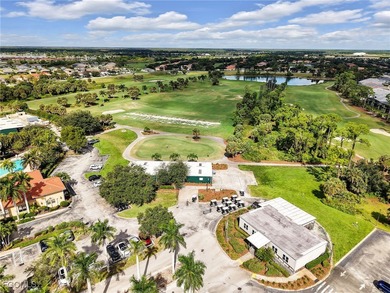 Discover exceptional living in this stunning two-story residence on Valencia Golf and Country Club in Florida - for sale on GolfHomes.com, golf home, golf lot