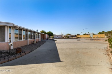 Great curb appeal to this corner lot 2 bed 2 bath furnished home on Fountain of the Sun Country Club in Arizona - for sale on GolfHomes.com, golf home, golf lot