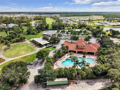 Discover exceptional living in this stunning two-story residence on Valencia Golf and Country Club in Florida - for sale on GolfHomes.com, golf home, golf lot