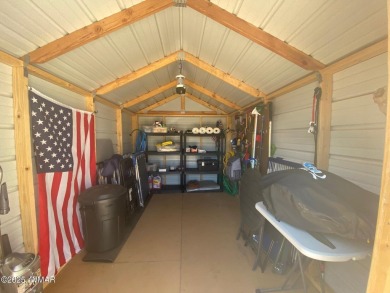 LOCATION LOCATION !!! This property is located with a view of on Juniper Ridge R.V. Golf Resort in Arizona - for sale on GolfHomes.com, golf home, golf lot