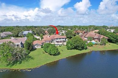 NEARLY ONE ACRE LOT! Breathtaking lakefront beauty is showcased on Frenchmans Creek Country Club in Florida - for sale on GolfHomes.com, golf home, golf lot
